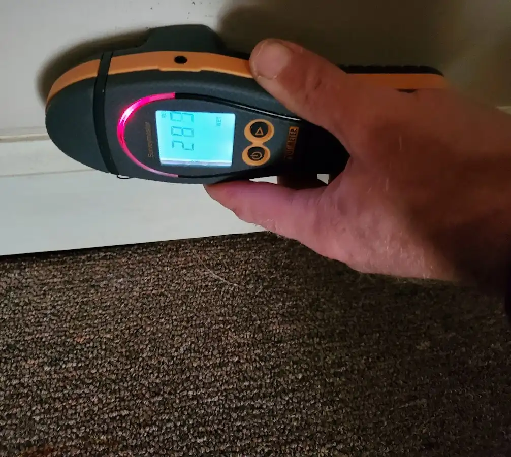 Moisture detection at baseboard during Sewage Cleanup & Sanitation in South Monrovia Island